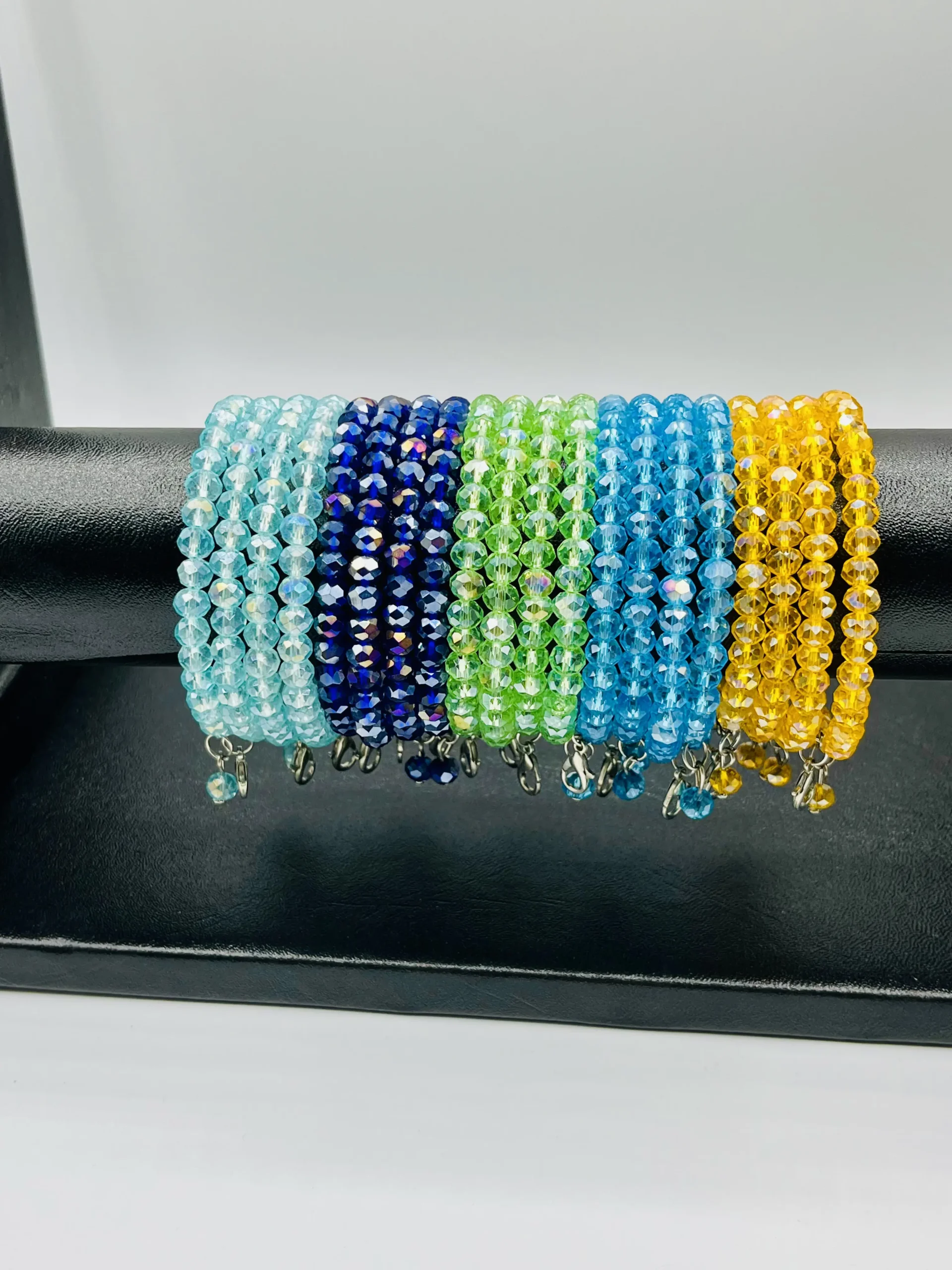 Single amber gold crystal beaded bangle worn casually showing everyday sparkle and comfortable fit for women