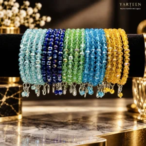 Set of five multicolour crystal beaded bangles in sky blue, royal blue, emerald green, turquoise, and amber gold for women