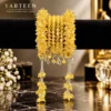 Yellow crystal gajra bracelet with silver accents and hanging tassel chains for mehndi and mayun